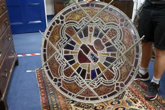 A set of eleven 19th century stained glass roundels, diameter 24in.